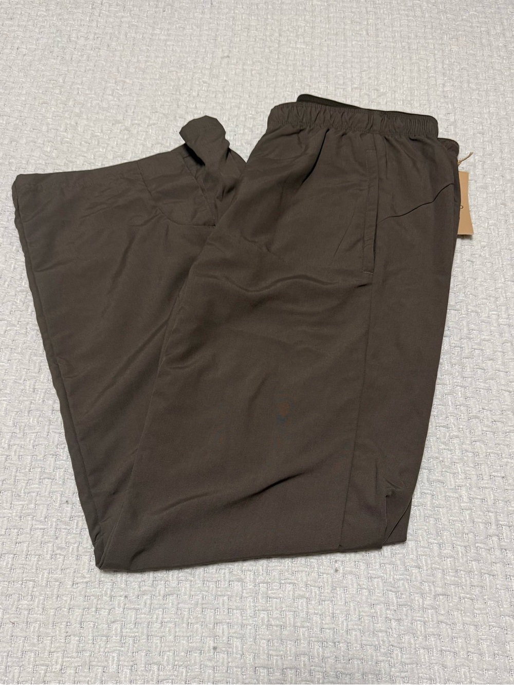 Paskho brown women’s travel pants, large. New with tags